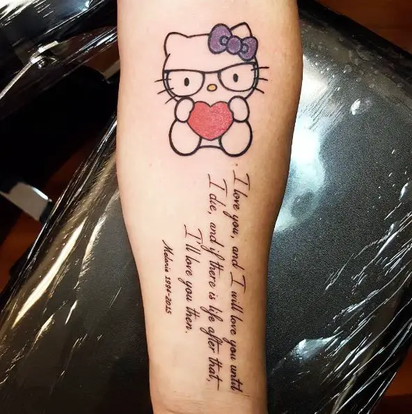 Lettering and Hello Kitty with Heart and Glasses Forearm Tattoo
