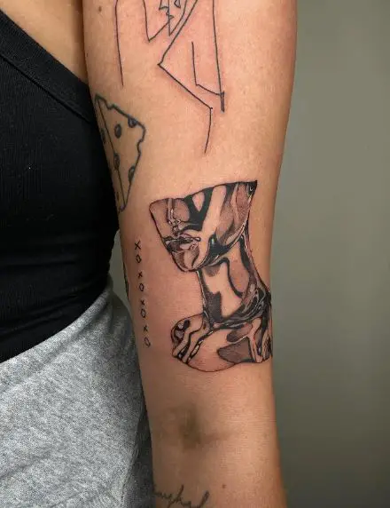 Black and Grey Woman Portrait Abstract Arm Tattoo