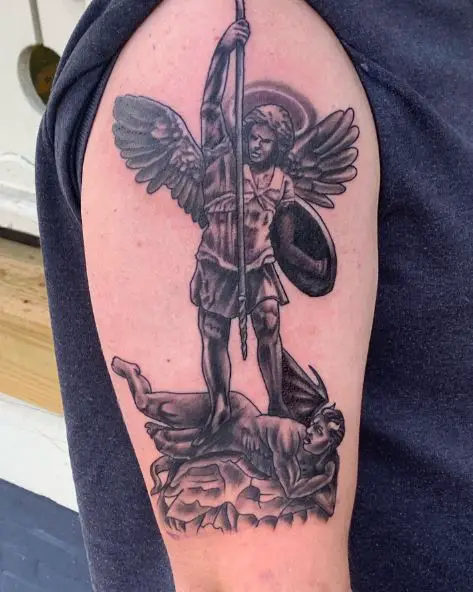 Saint Michael with Spear and Shield Defeating Satan Arm Tattoo