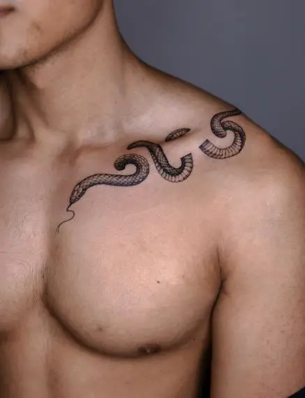 Black and Grey Snake Collarbone Tattoo