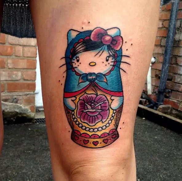 Traditional Colorful Hello Kitty Russian Doll Above Knee Tattoo