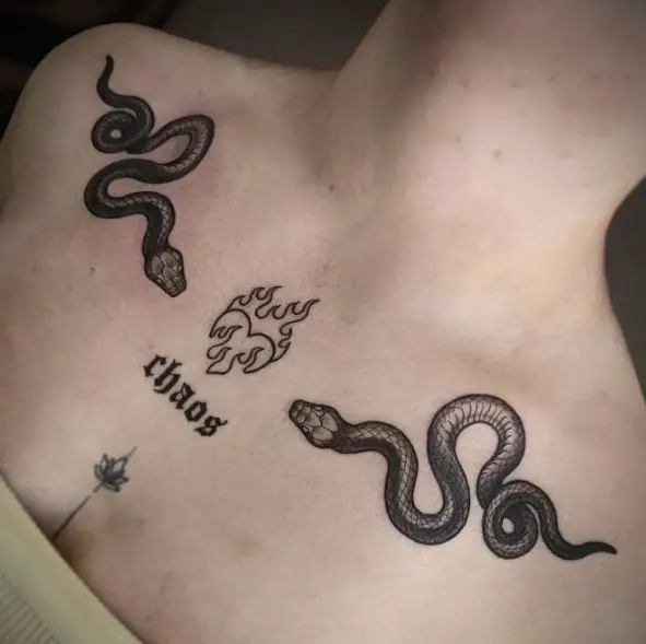 Heart on Fire and Two Snakes Collarbone Tattoo