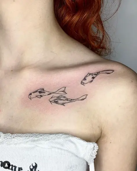 Black and Grey Koi Fishes Collarbone Tattoo