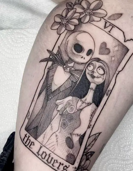 Black and Grey Jack Skellington and Sally, as Tarot Card Inner Biceps Tattoo