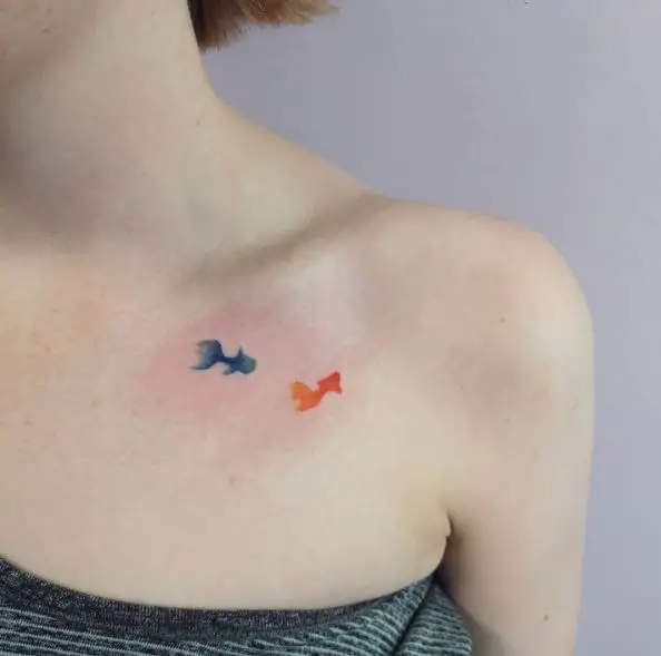 Minimalistic Colorful Koi Fishes Collarbone Tattoo