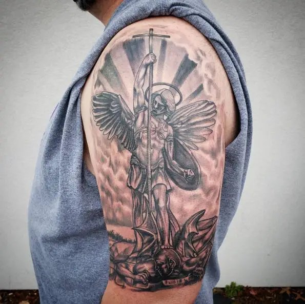 Sun and Saint Michael with Spear and Halo Defeating Satan Arm Tattoo