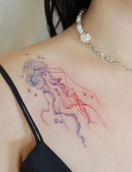 Colorful Jellyfish Collarbone Tattoo