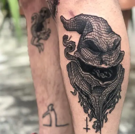 Black and Grey Pattern Oogie Boogie Leg Tattoo