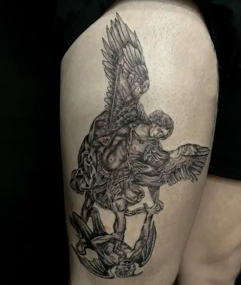 Black and Grey Saint Michael with Sword Defeating Satan Thigh Tattoo