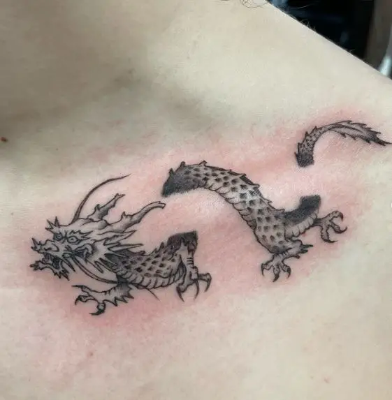 Black and Grey Dragon Collarbone Tattoo