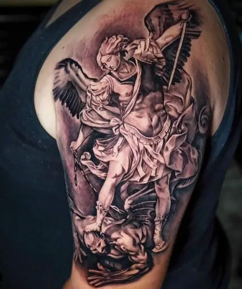 Black and Grey Saint Michael with Sword and Chain Defeating Satan Arm Tattoo