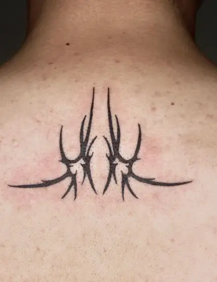 Black Symmetrical Tribal Abstract Spine Tattoo