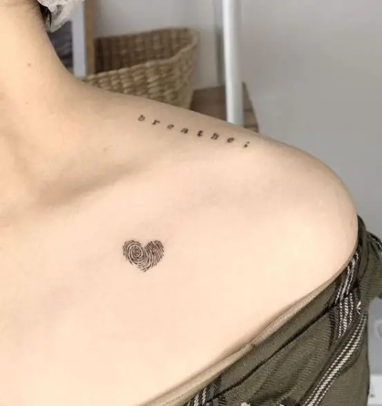 Script and Patterned Heart Collarbone Tattoo