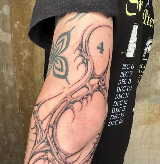 Grey Shaded Tribal Abstract Elbow Tattoo