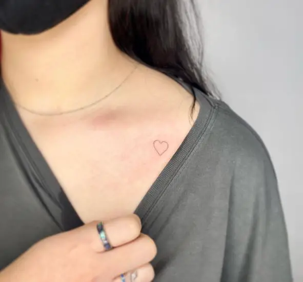 Minimalistic Heart Collarbone Tattoo