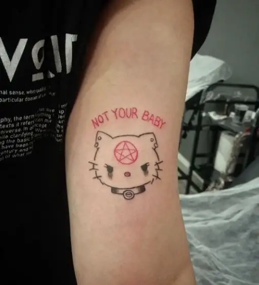 Script and Goth Hello Kitty with Red Pentagram Arm Tattoo
