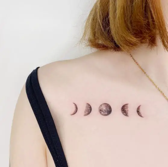 Black and Grey Moon Phases Collarbone Tattoo