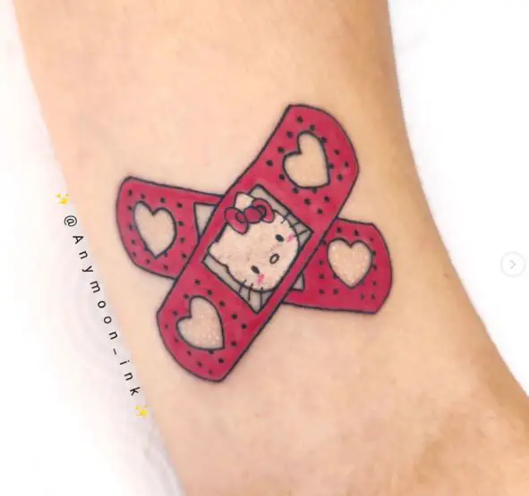 Red Hello Kitty Band-Aid with Hearts Forearm Tattoo