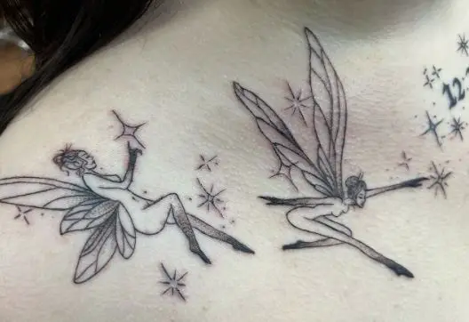 Grey Stars and Fairies Collarbone Tattoo