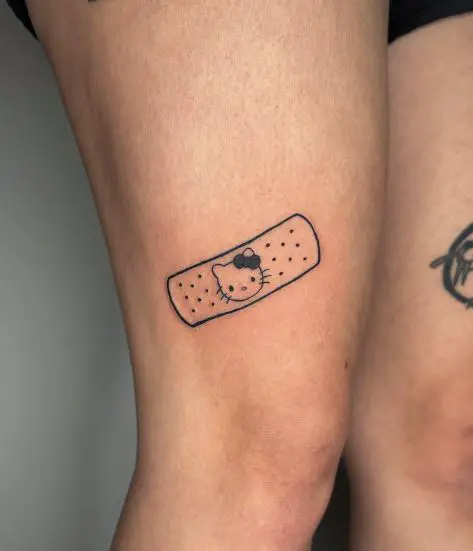 Black Hello Kitty Band-Aid Thigh Tattoo