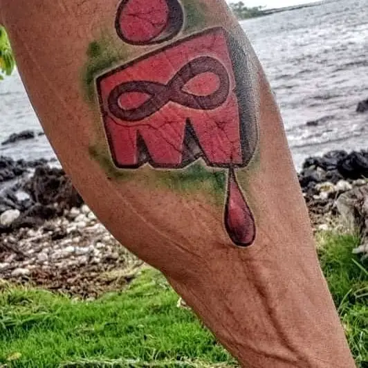 Creative M Dot Blood Drop Tattoo