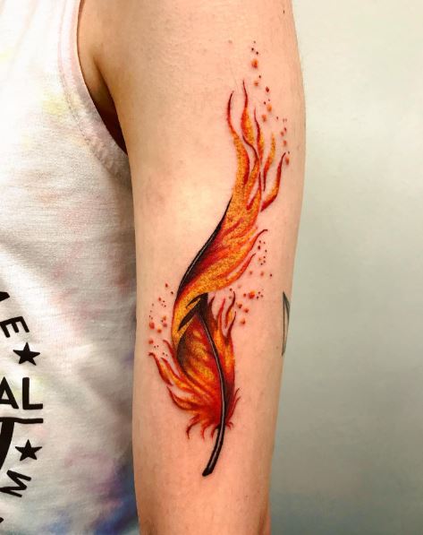 Flaming Phoenix Feather Arm Tattoo