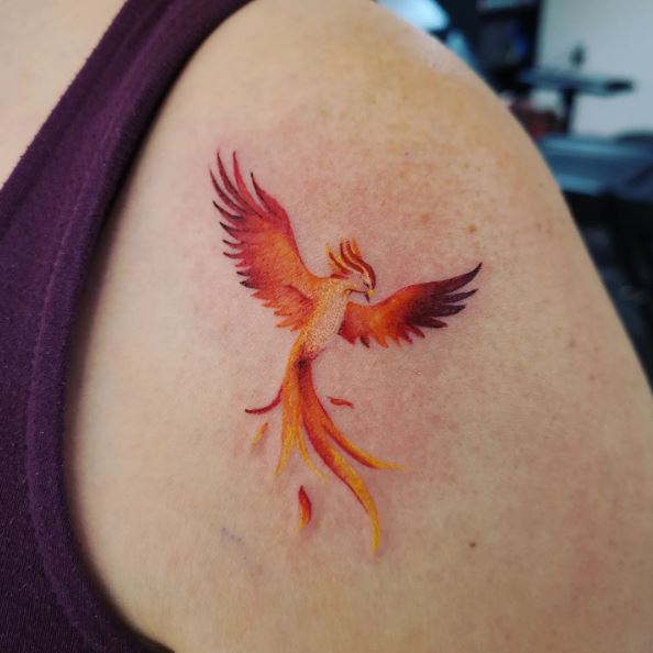 Orange Ink Phoenix Bird Tattoo