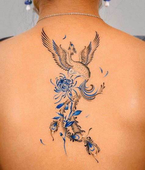 Phoenix Flying with Chrysanthemum Flowers Back Tattoo