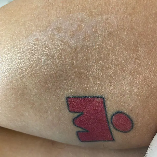 Red Simple M Dot Tattoo