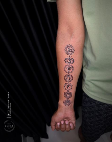 Chakras tattoo on the shin