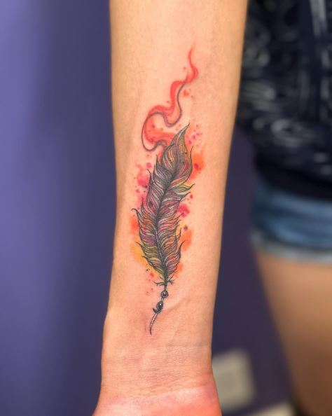Watercolor Phoenix Feather Wrist Tattoo