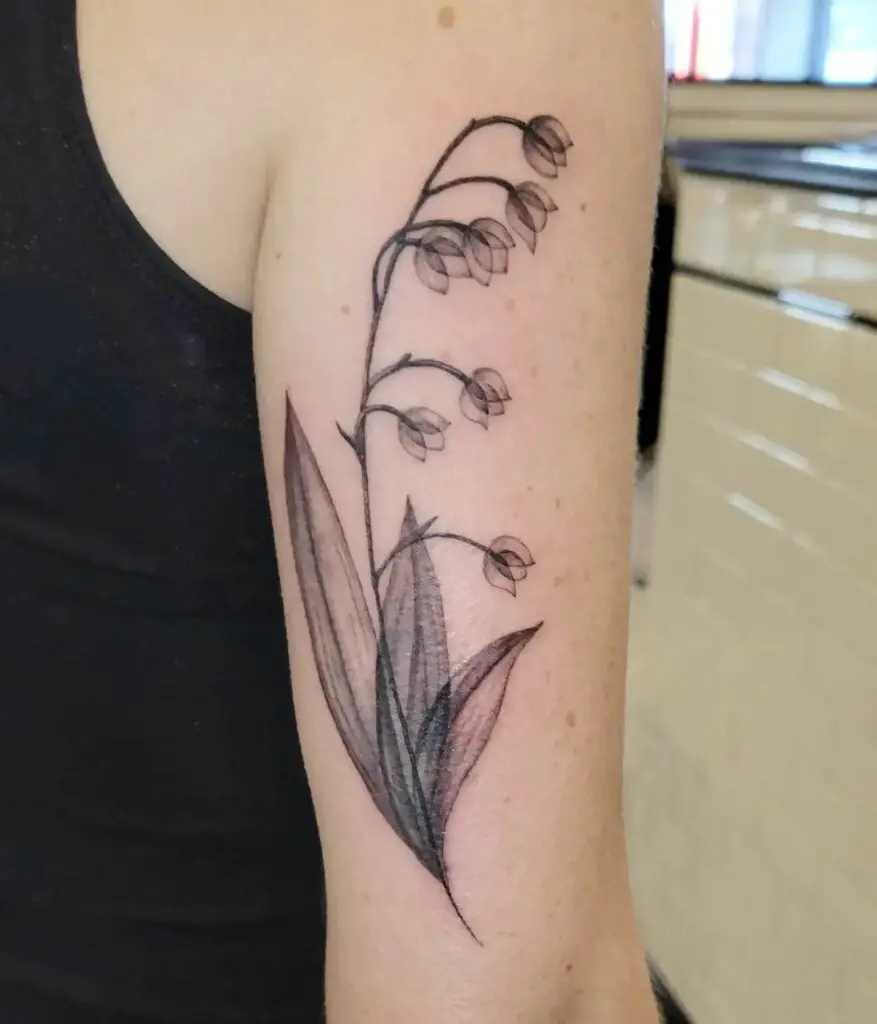 Bent Black and Grey Lily Flower Arm Tattoo