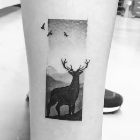 Deer with Flying Birds in Landscape Leg Tattoo