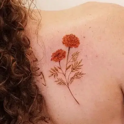 Dense Orange Marigold Flower Shoulder Tattoo