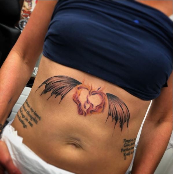 Fallen Angel Wing Flaming Heart Tummy Tattoo