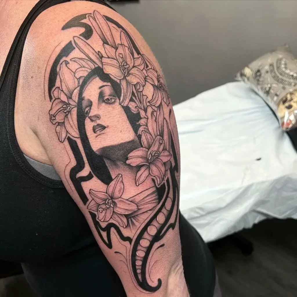 Godly Witch and Orchid Flowers Tattoo