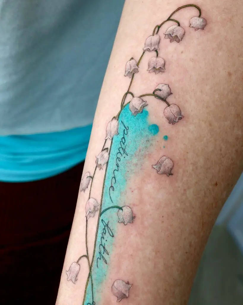 Lily of the Valley Flower with Blue Watercolor Phrase Arm Tattoo