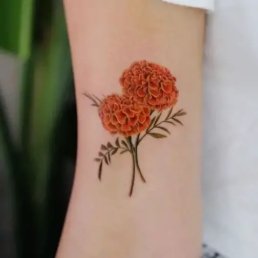 Lovely Pair of Marigold Flower Arm Tattoo