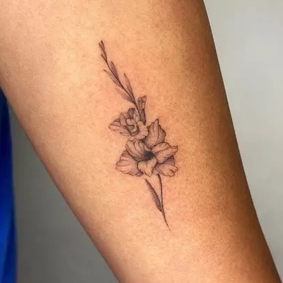 Minimal Gladiolus Flower Tattoo Design