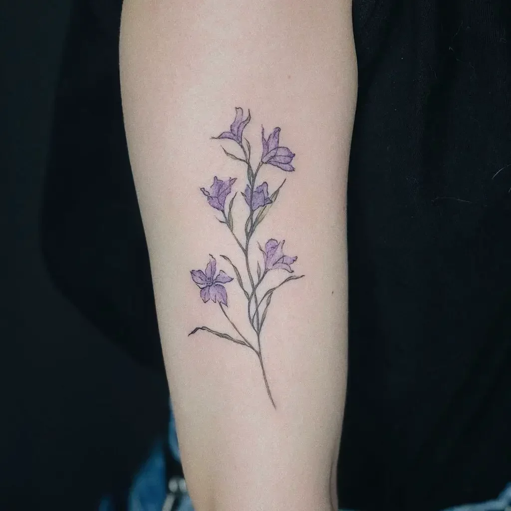 Purple Larkspur Flower on Branch Stalk Tattoo Design