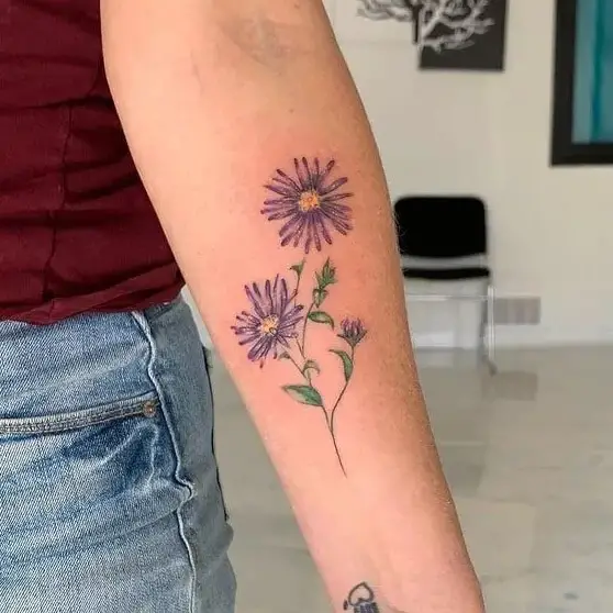 Round Yellow Center Aster Flower Wander Lust Tattoo Design