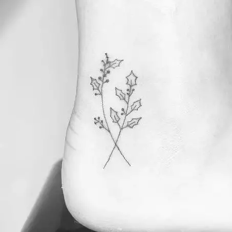Simple Line Art Holy Flower Ankle Tattoo