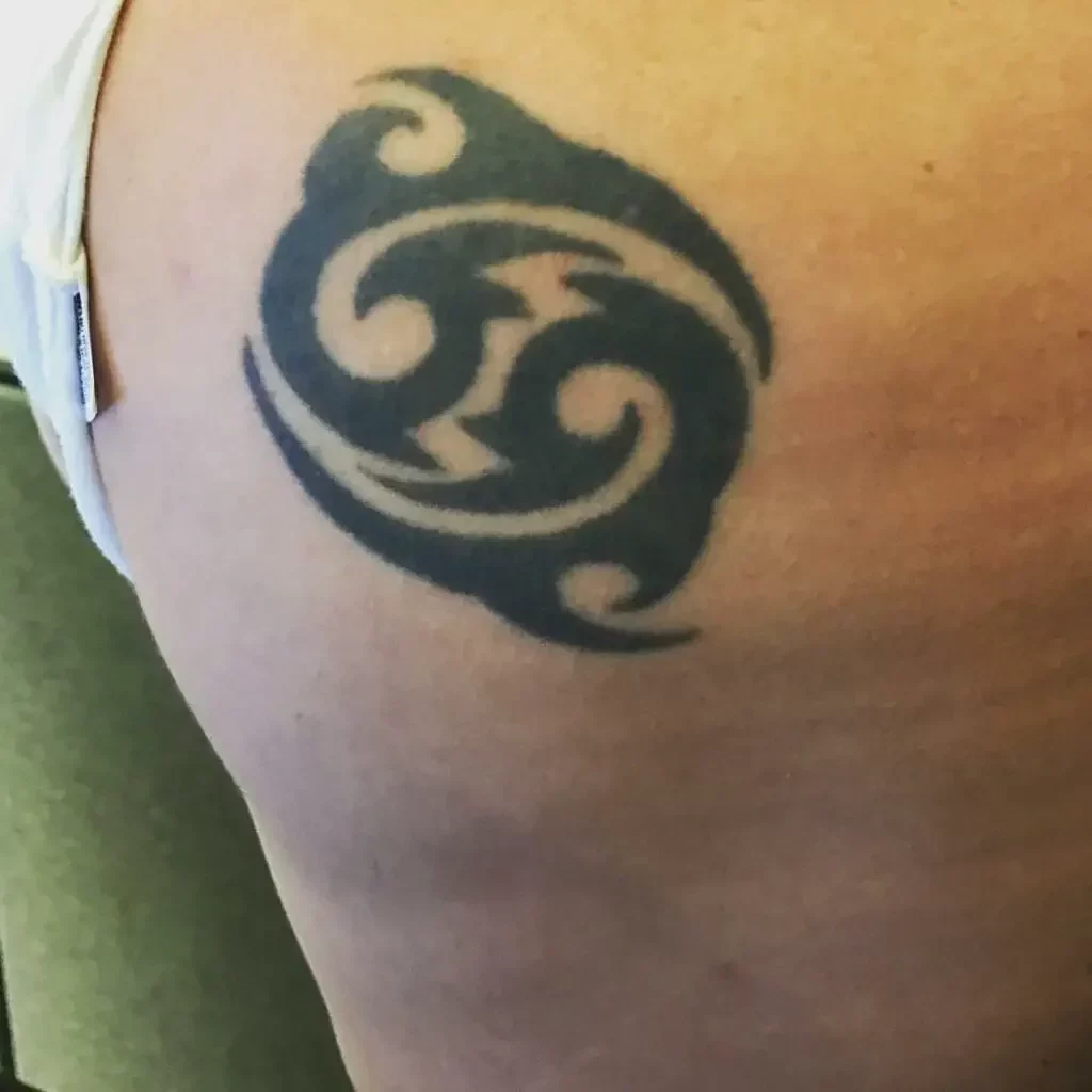 Solid Black And Bold Cancer Zodiac Sign Tattoo