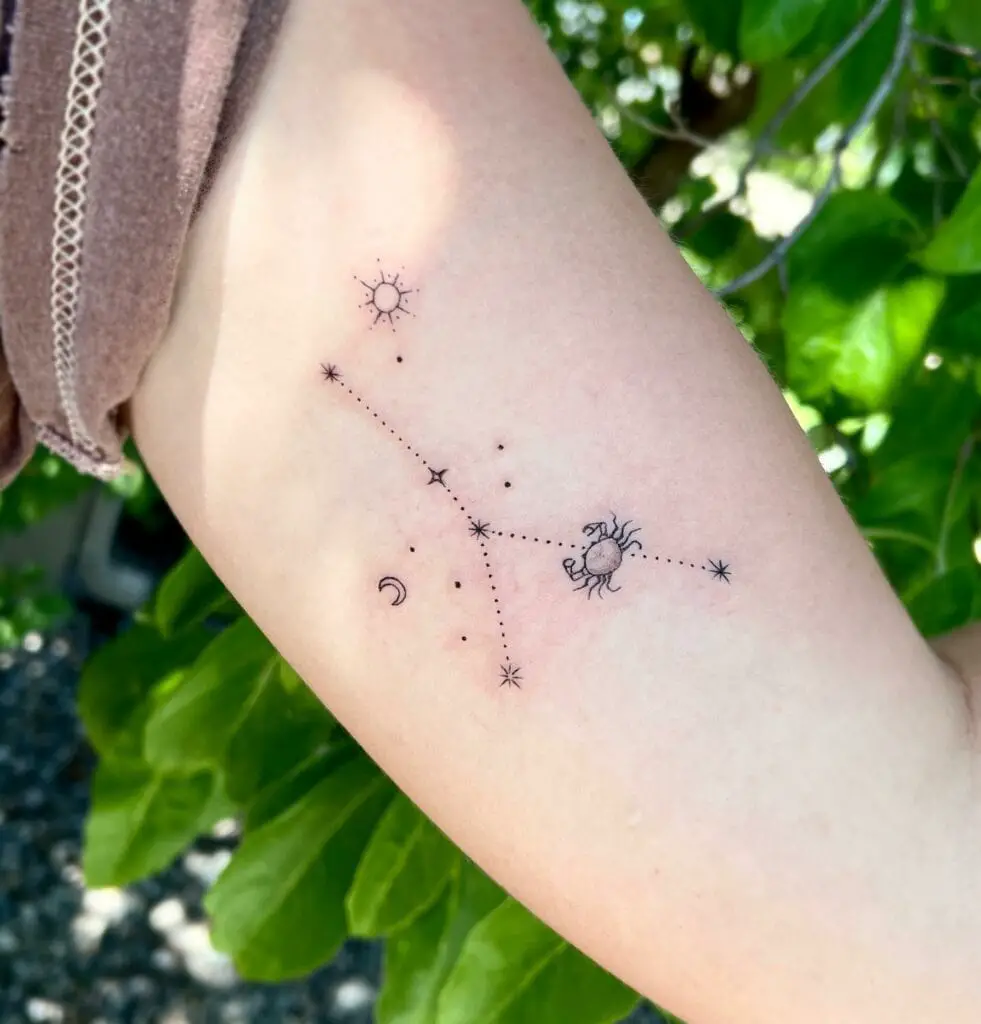 Sun And Crescent Moon Crab In Constellation Arm Tattoo