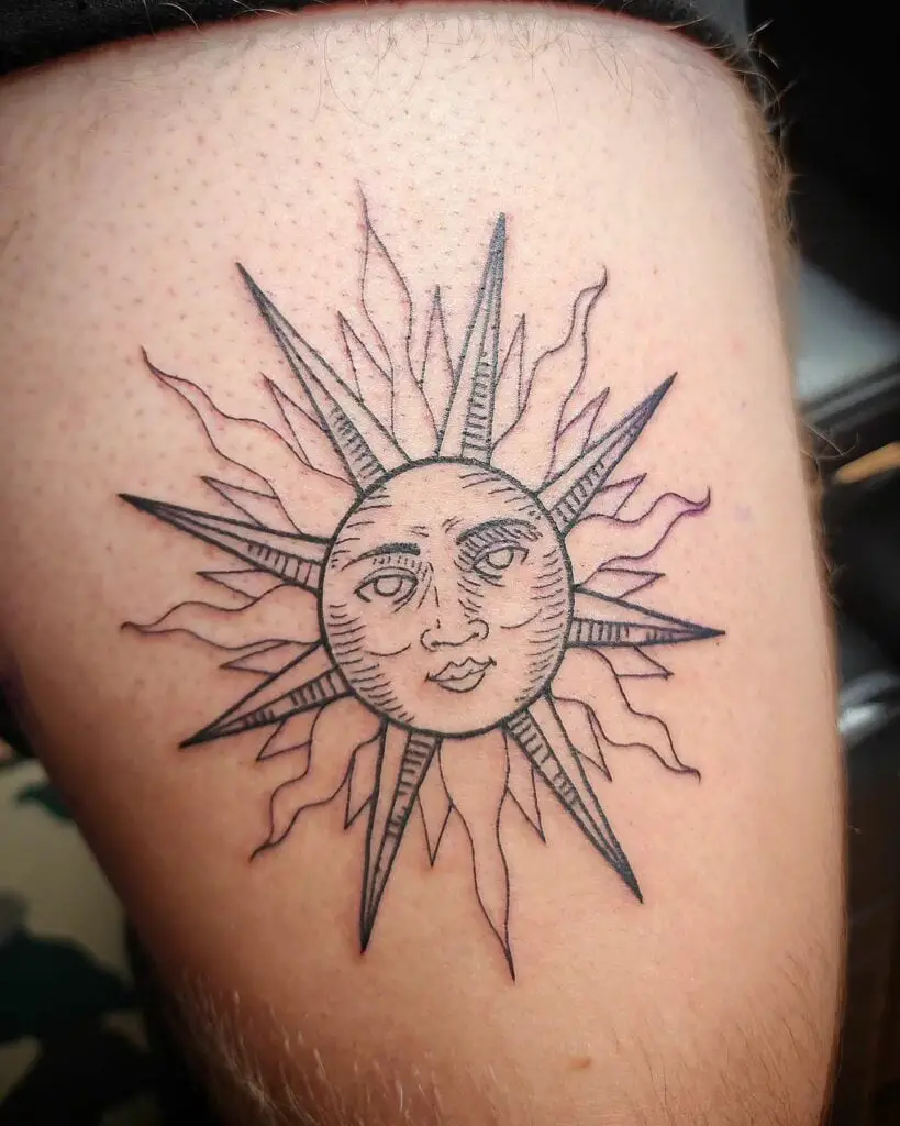 Sun Face with Radiant Rays Tattoo