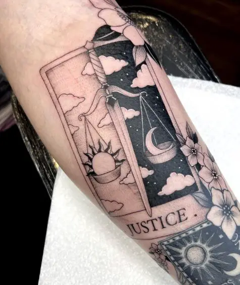 Sun and Moon on Scales of Justice Tattoo