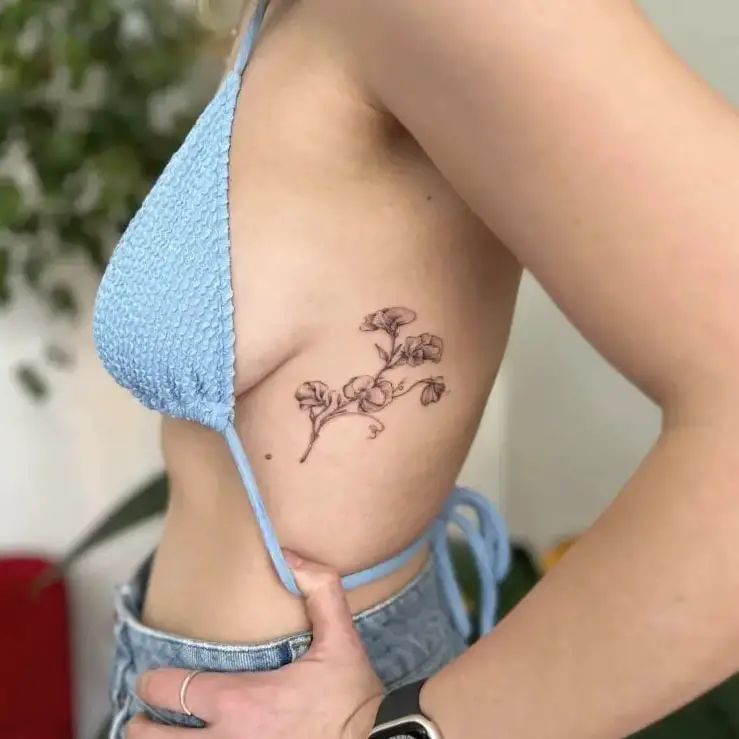 Sweet Pea Flower Rib Tattoo Design
