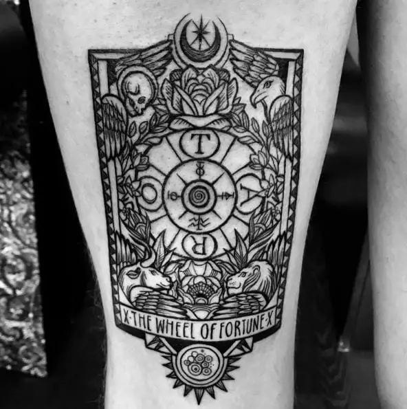 Wheel of Fortune Tarot Card with Flowers and Skulls Tattoo
