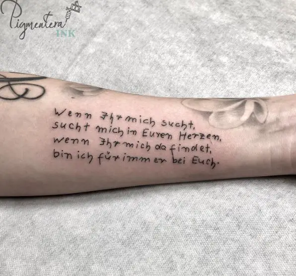 Black Ink Condolence Message Forearm Tattoo