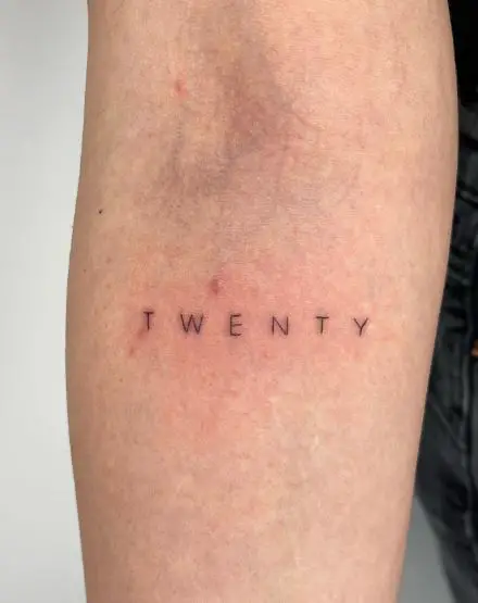 Beautiful Fineline “Twenty” Script Tattoo